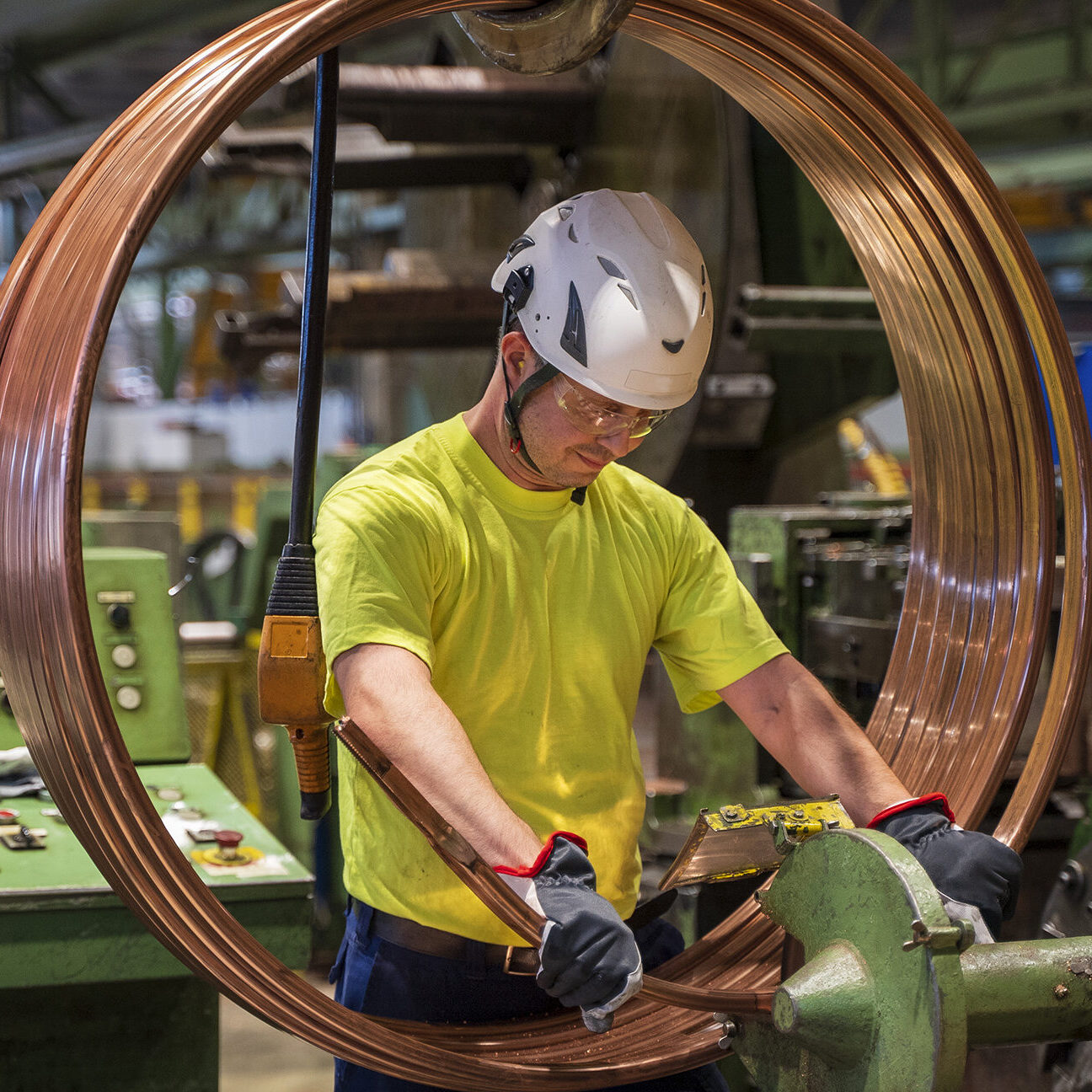 Employee working with copper products