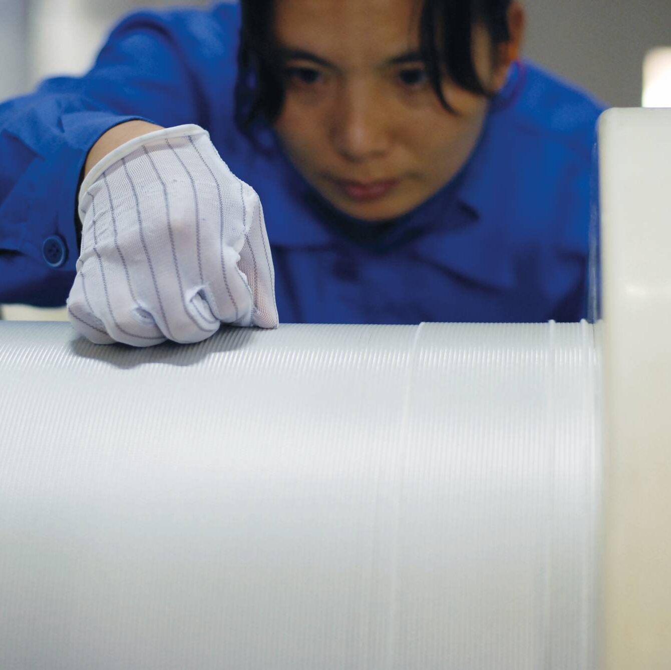 Luvata Zhongshan employee working with braided wire